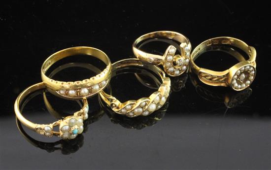 Five gem set rings.